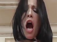 This black haired beauty pisses hard from her ass