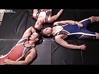 Three wrestlers jerk themselves off together