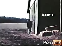 Two cowboys fuck each other outdoors in vintage porn